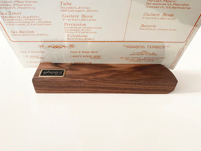 Front view of the walnut now playing stand with a record sleeve